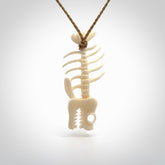 Hand carved bone fish skeleton pendant. Hand made bone fish necklace. Fish themed jewellery. Ocean themed pendant. One only necklace provided with adjustable cord and free delivery.